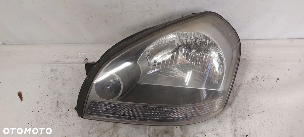 .  PRZOD PRZEDNIA LAMPA LEWA HYUNDAI TUCSON 1 - 1