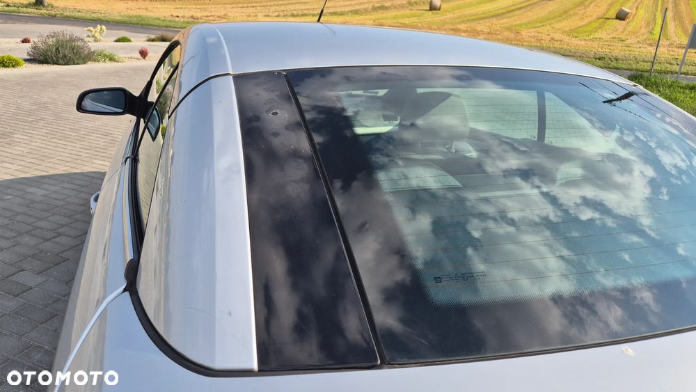 Opel Astra 2.0 T Cosmo - 14