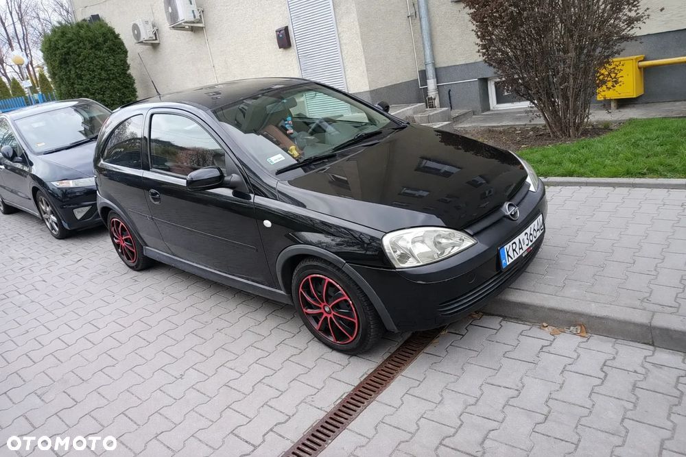 Opel Corsa 1.2 16V NJoy - 4