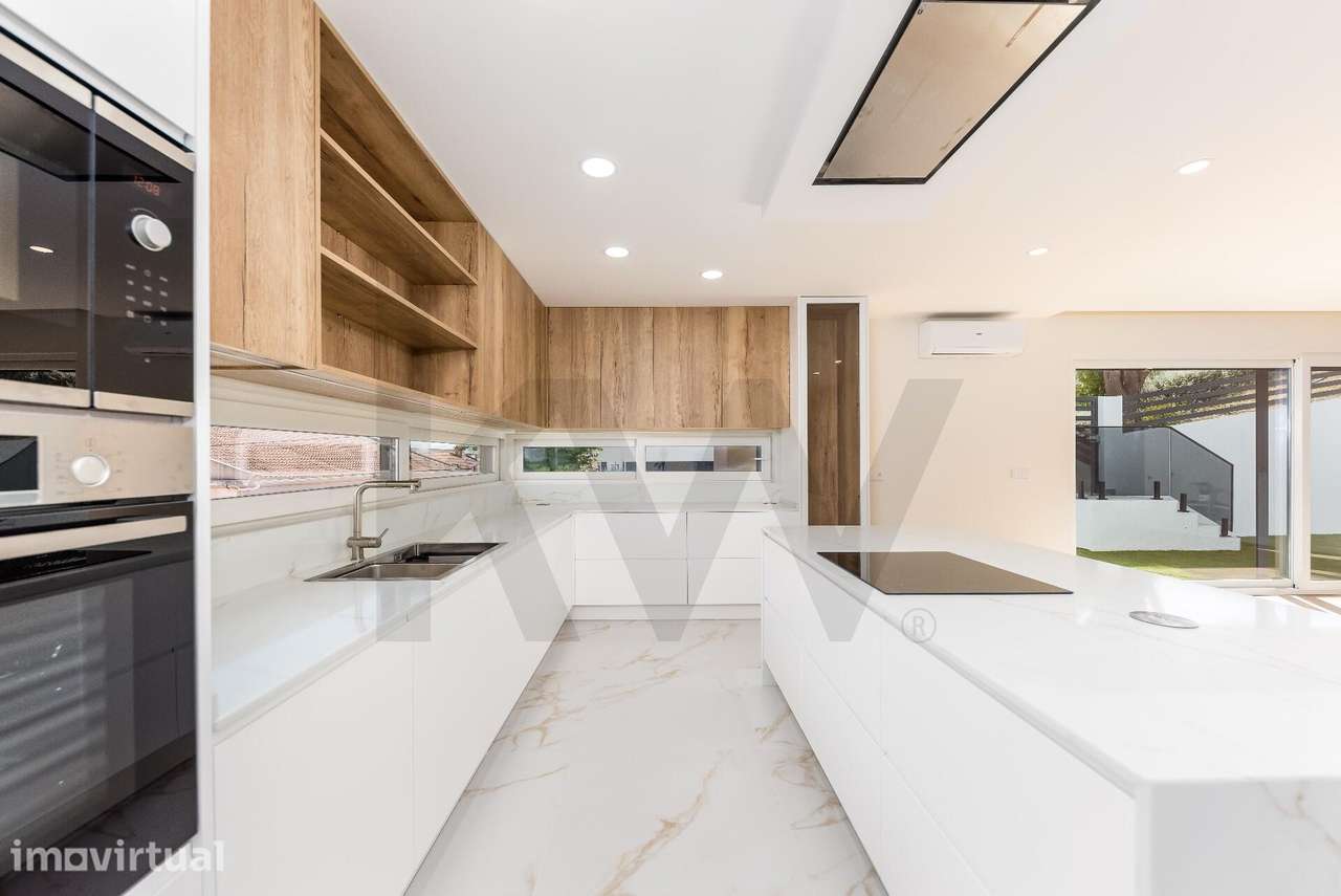 MORADIA NOVA EM ODIVELAS, T5 COM DUAS SUITES  PISCINA E GARAGEM PARA D - Grande imagem: 5/25