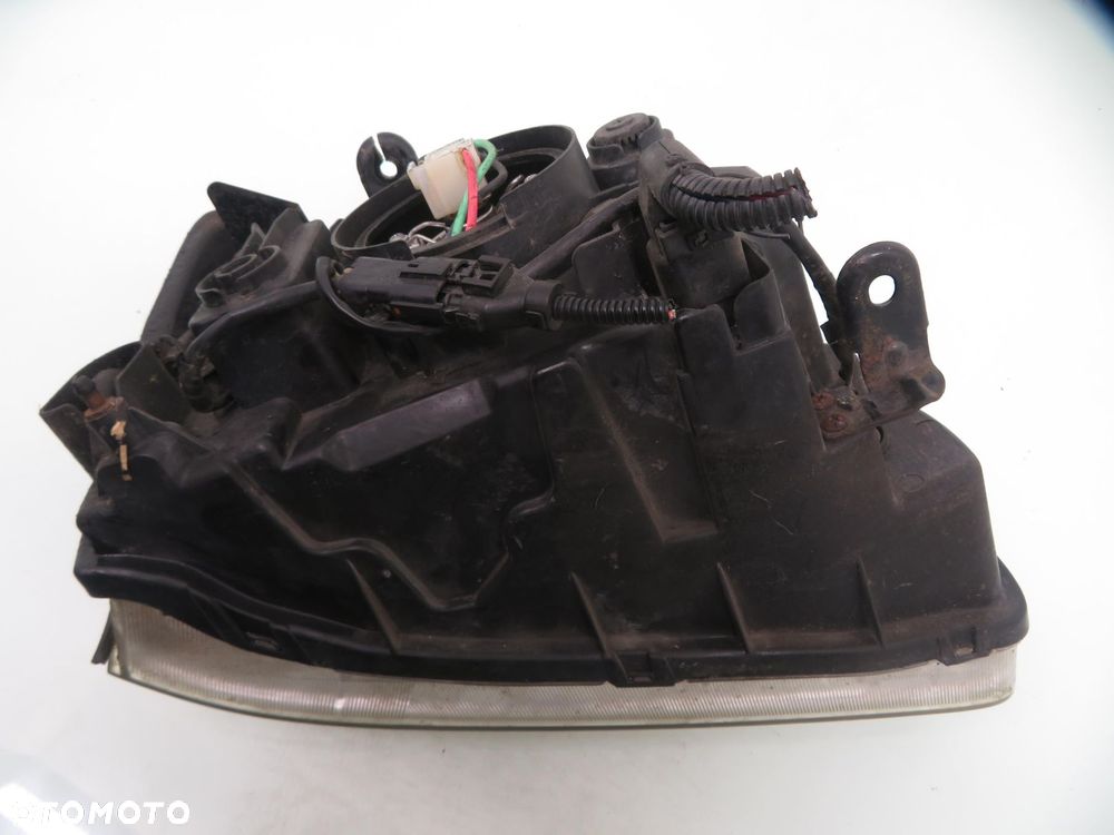 LAMPA LEWA PRZEDNIA KIA CARENS II - 5