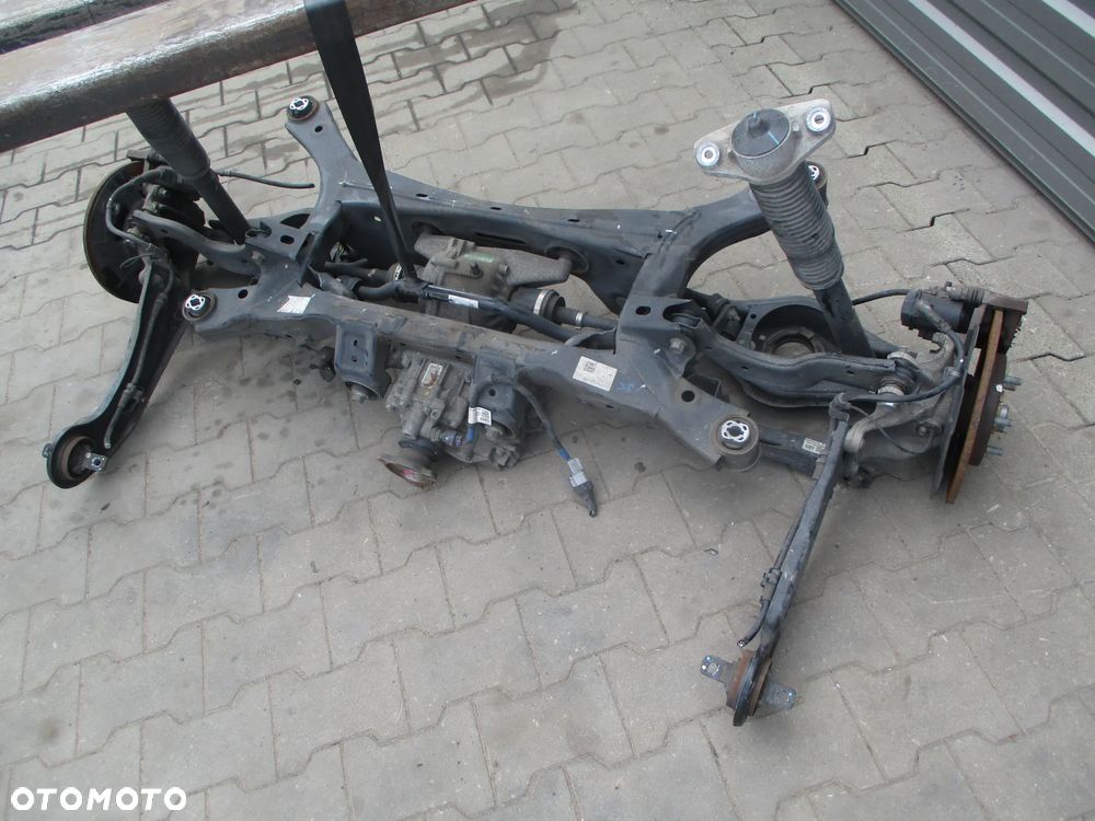 HYUNDAI TUCSON IV 21-  4WD BELKA TYLNA ZAWIESZENIA WÓZEK TRAWERS - 1