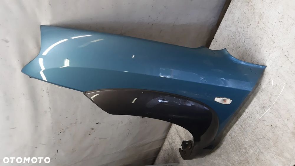 * Hyundai Tucson I 1 błotnik LEWY przedni przód MORSKI KOLOR HE - 3