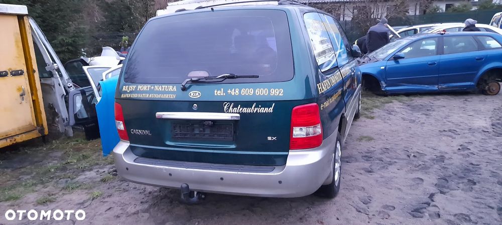 blotnik prawy lampa  Kia Carnival I  99-06r - 5