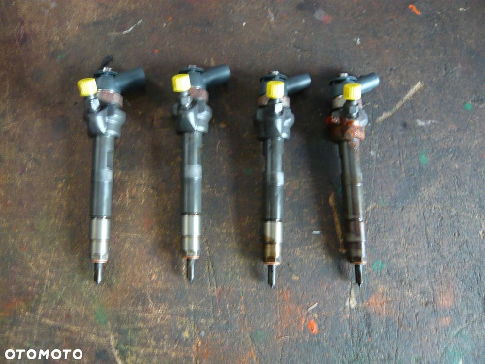 wtryskiwacz 779844606 bmw e90 e87 e81 - 1