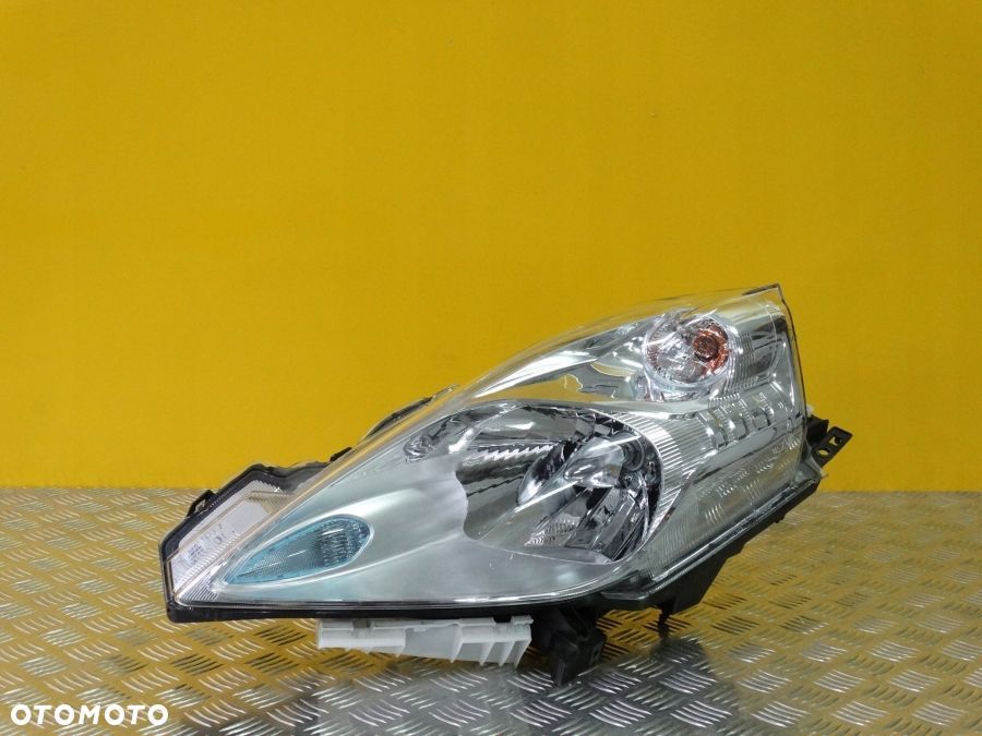 NISSAN LEAF 2010- REFLEKTOR LAMPA PRZÓD ZWYKŁA LEWA USA - 1