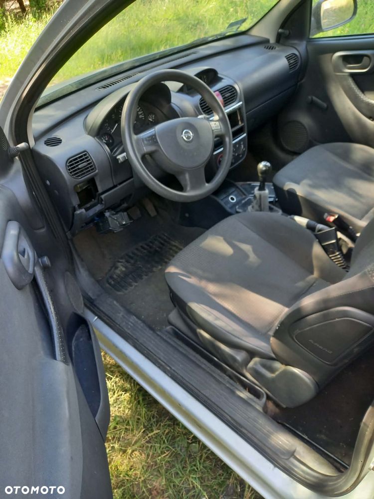 części OPEL CORSA C hatchback 3drzwi 1.0 benzyna 2002r. Srebrny maska drzwi zderzak klapa fotele - 7
