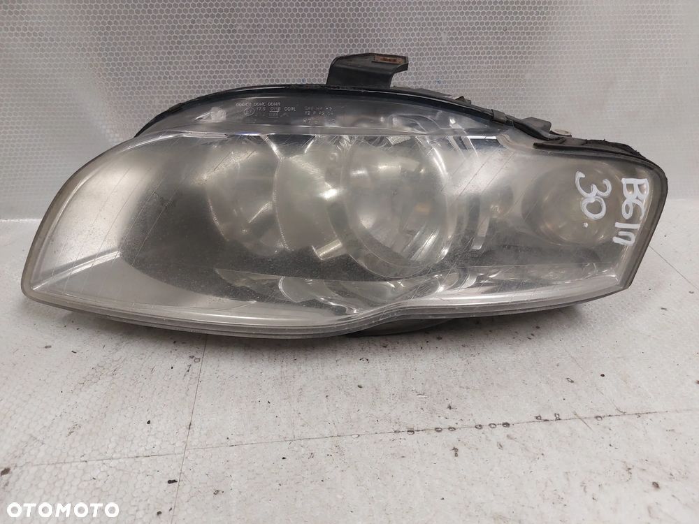 .  LAMPA PRZOD PRZEDNIA LEWA AUDI A4 B7 - 1