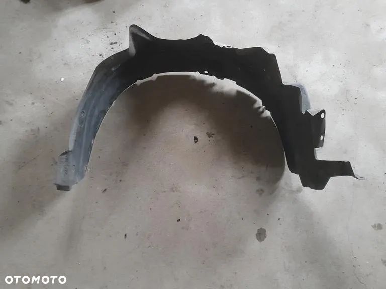 nadkole lewe przód Daihatsu Sirion II Subaru Justy IV 53876-B1020 - 1