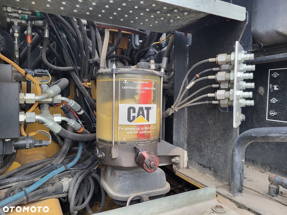 Caterpillar M 318 F / z Niemiec / - 13