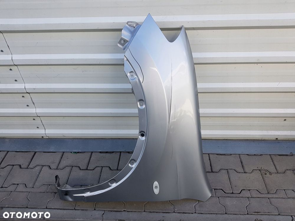 NISSAN QASHQAI I LIFT 10-13r BŁOTNIK LEWY PRZÓD KY0 KY0G