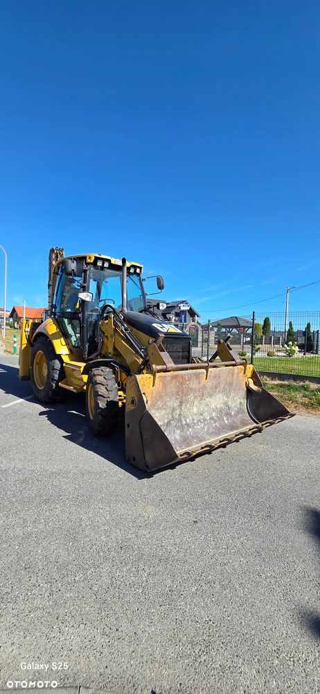 Caterpillar 428 E - 7