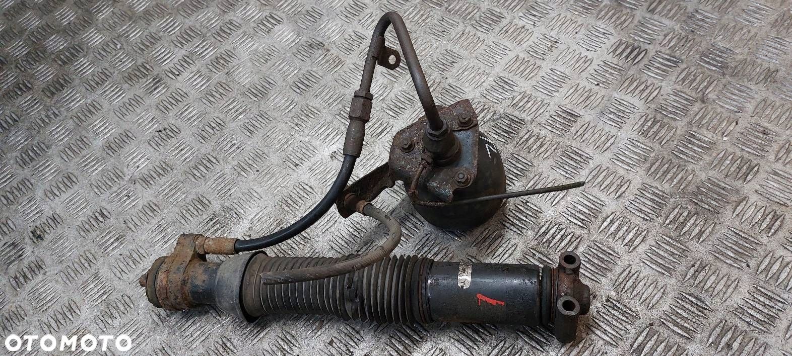 AMORTYZATOR LEWY TYŁ MERCEDES W210 NIVO - 1