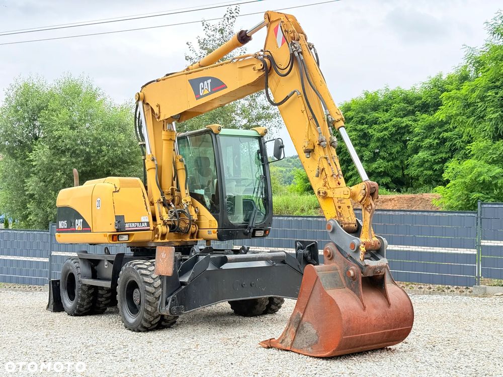 Caterpillar CAT M315C  CATERPILLAR SPROWADZONY  Bardzo Dobry Stan - 18