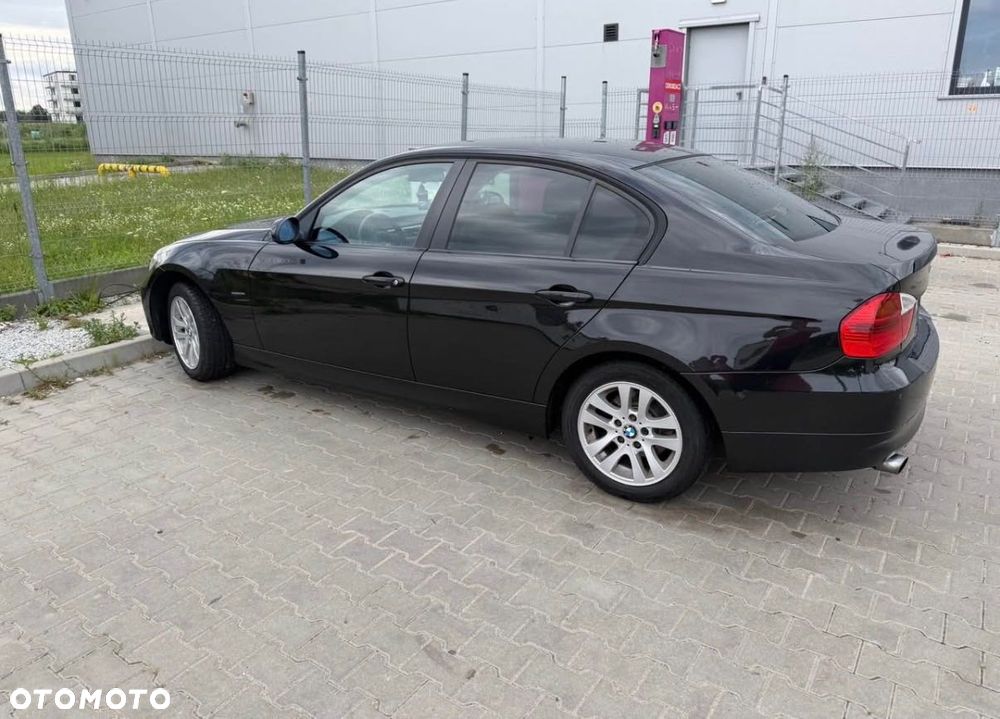 BMW E90 2007 photo 2