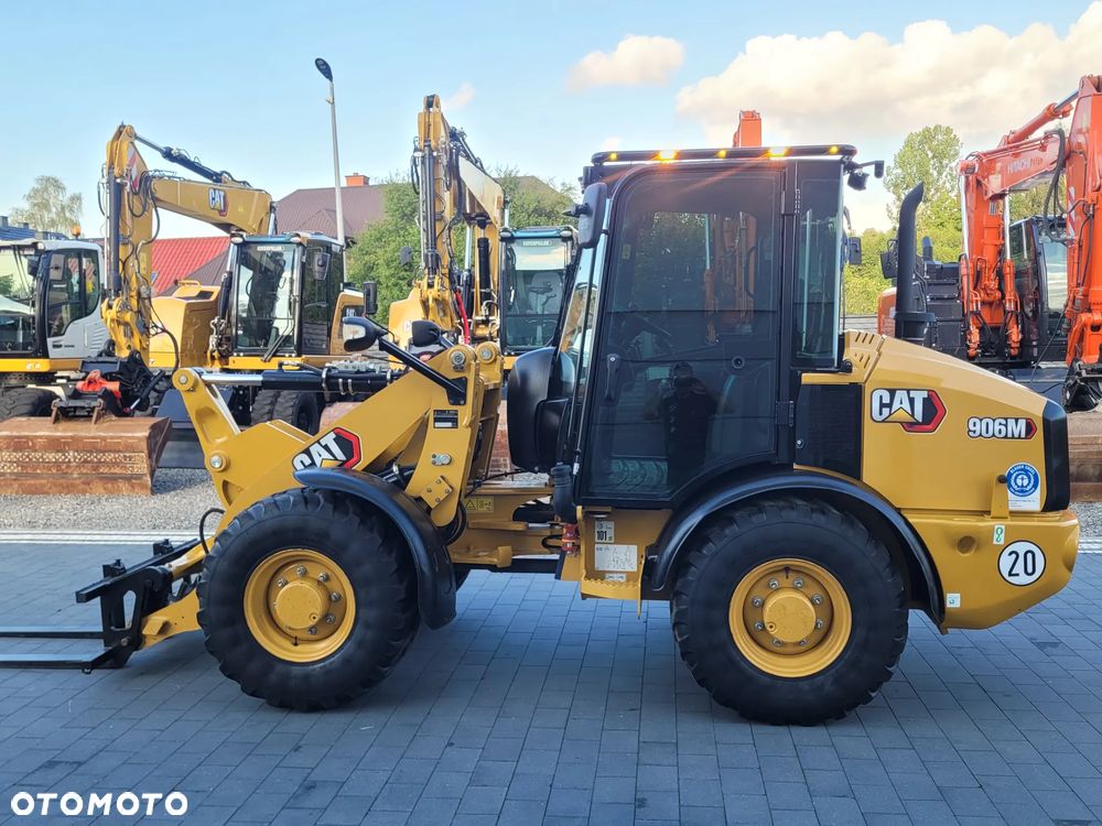Caterpillar 906M / widły + łyżka otwierana / model 2022 r. / STAN IDEALNY / - 4