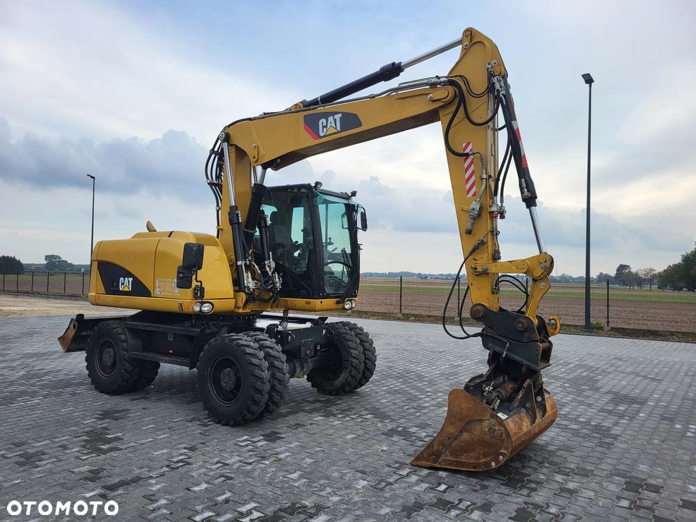 Caterpillar M 313 D / Stan idealny / - 6