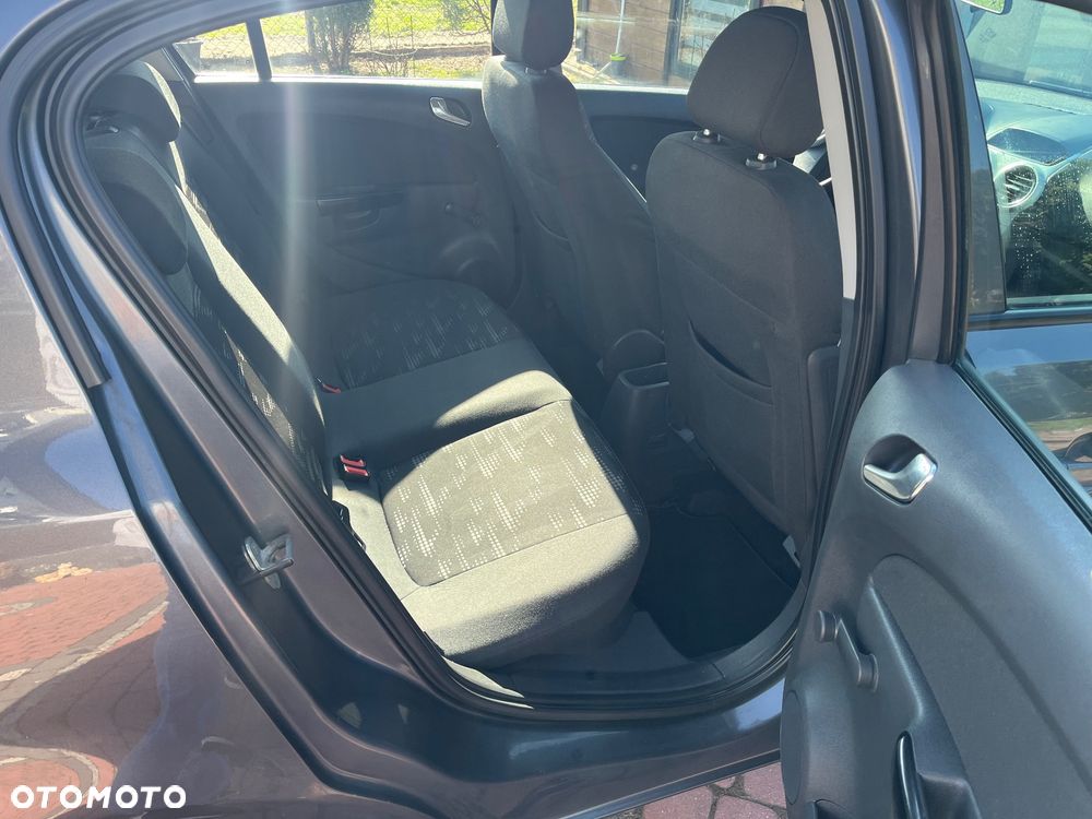 Opel Corsa 1.2 16V Enjoy - 11