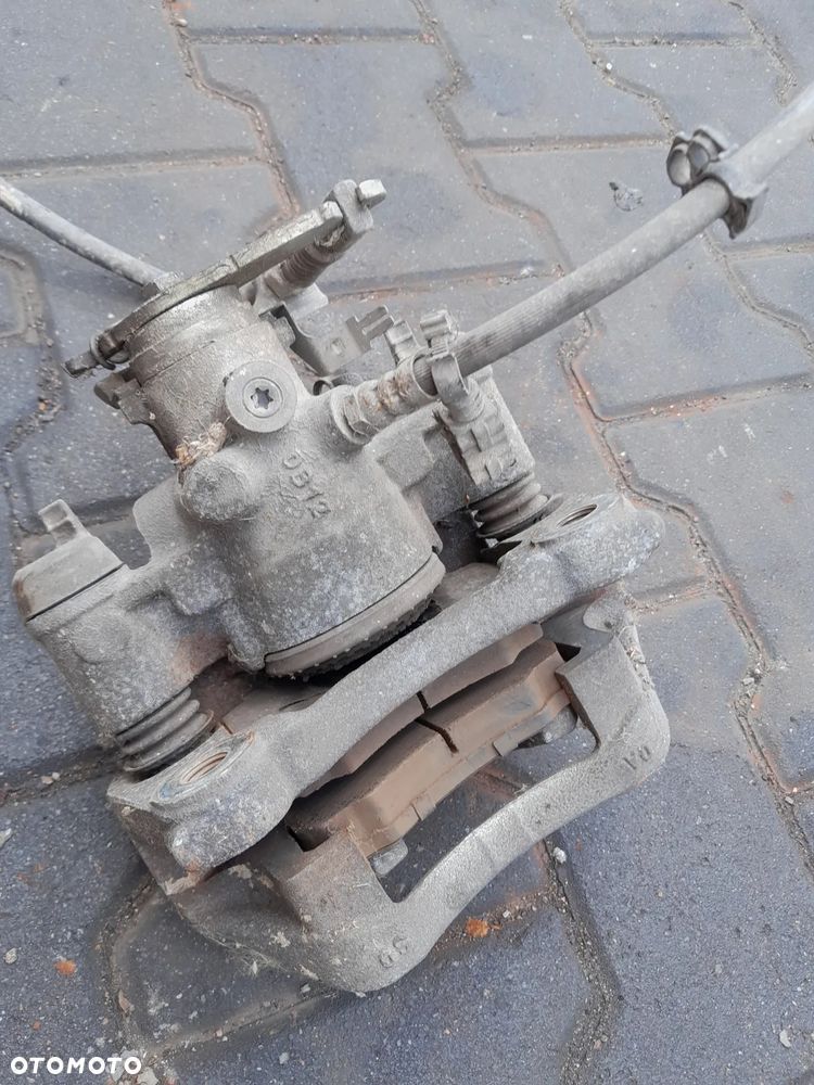 Zacisk tylny prawy Iveco Daily 15r poj. koło - 2