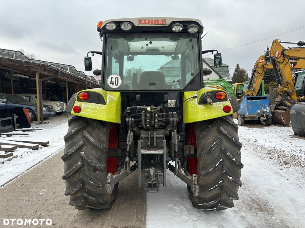 Claas Axos 320 - 4
