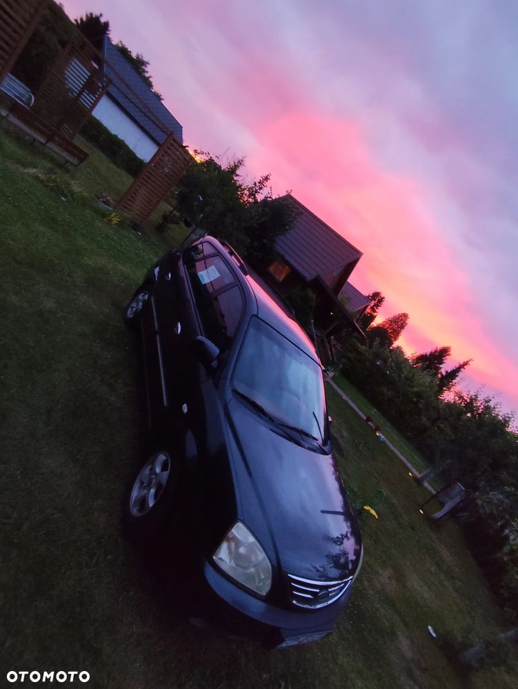Kia Carens 2.0 CRDi EX - 13