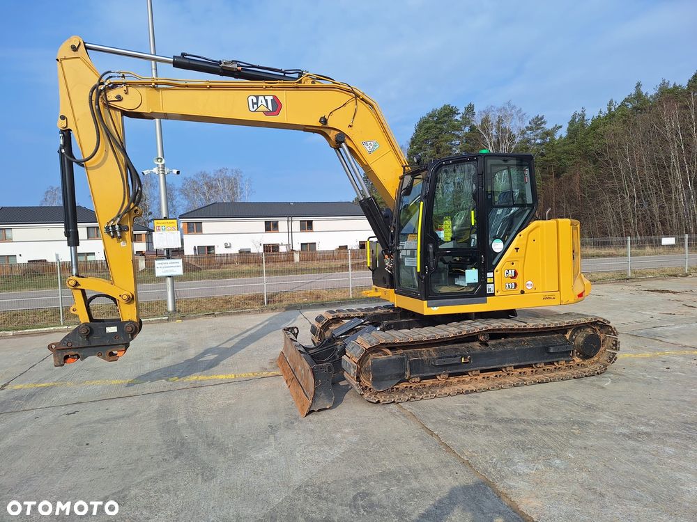 Caterpillar 310 - 4