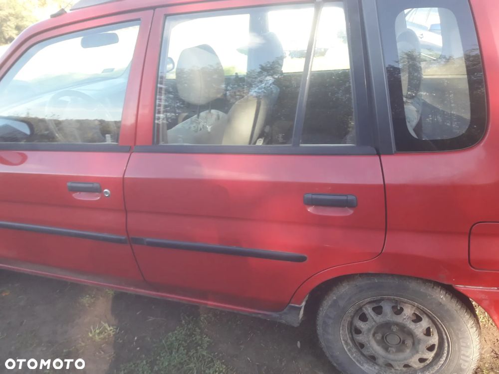 Mazda Demio 97-Klapa Zderzak tylny szybapas  lampa belka Kolor SU - 8
