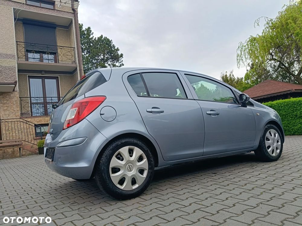 Opel Corsa 1.2 16V Enjoy - 23