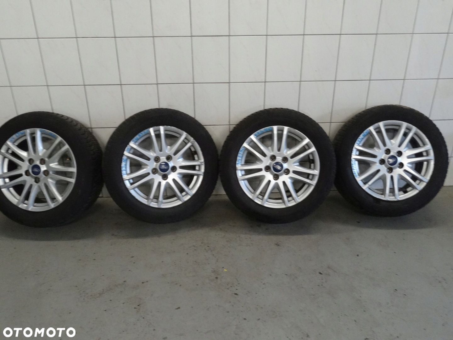 FORD KOŁA FELGI ALUMINIOWE E7Jx16H2 ET50 FALKEN EUROALL SEASON 205/55 R16 - 1