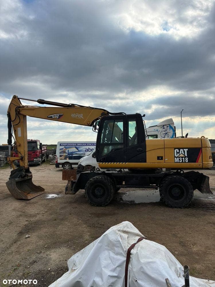 Caterpillar M318C - 20