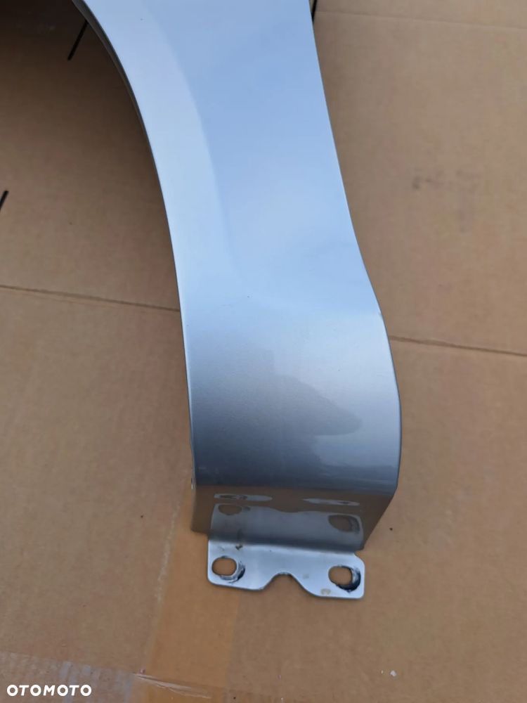 Błotnik przód lewy Opel Corsa D kod lakieru Z157 - 3