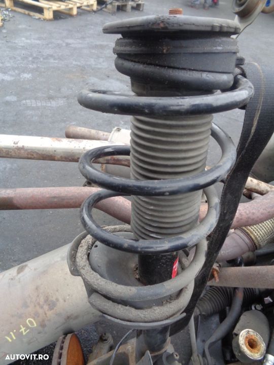 Vand  fata dreapta-stanga amortizor arc ford focus2 1.6i 120ron/buc - 1