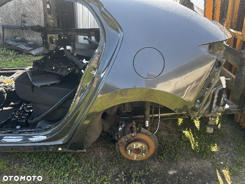 Błotnik tył mazda 3 bp 19-23r - 1
