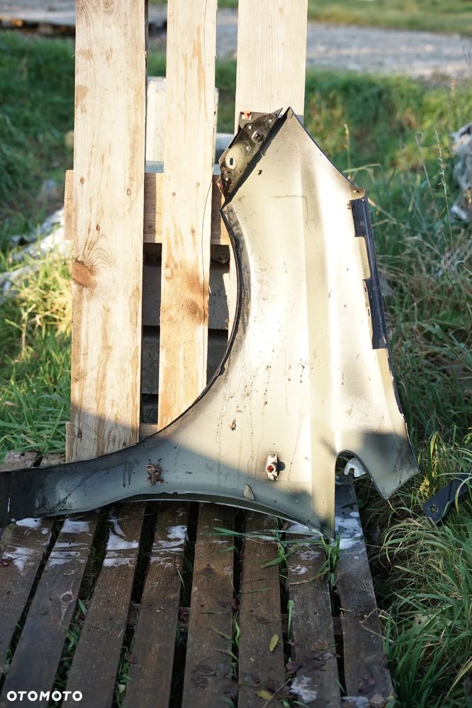 Błotnik przód przedni prawy Opel Corsa D Z20R - 6