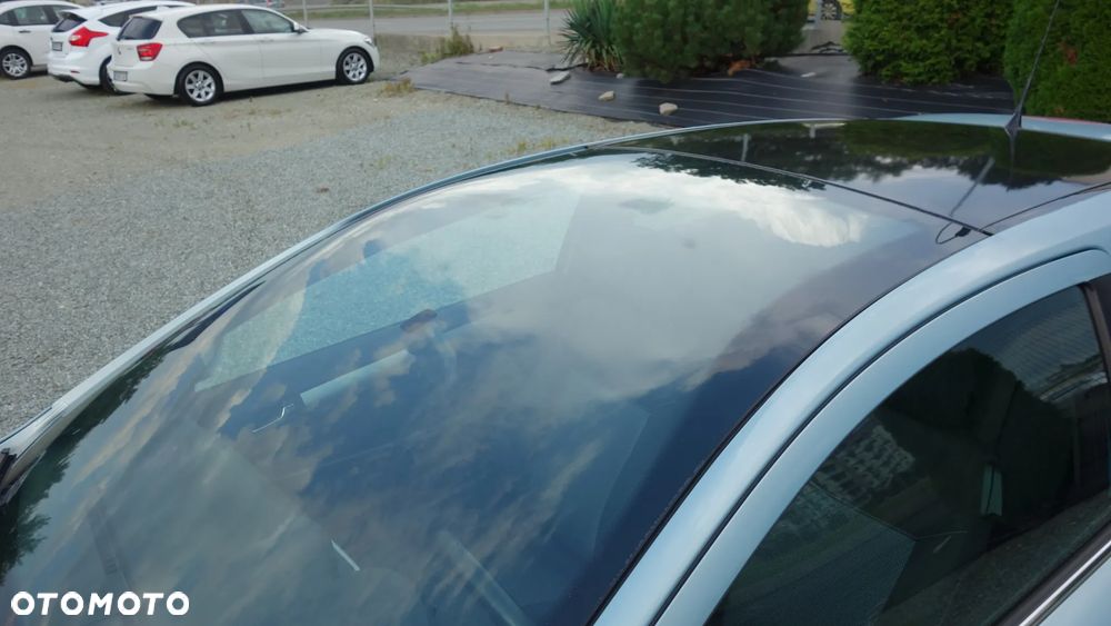 Opel Astra 1.8 Sport - 4