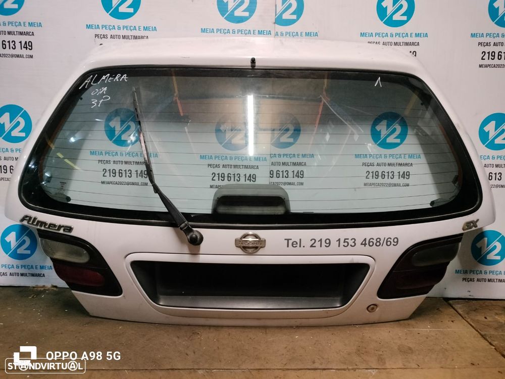 Tampa da Mala Nissan Almera de 3 portas do ano 2001 - 1