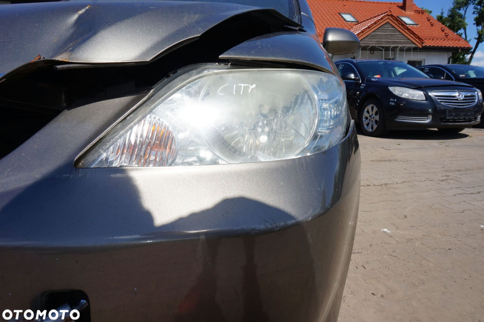 LAMPA PRZEDNIA LEWA CITY IV GE4 LIFT 33151-SEL-Y61 HONDA 2005-2008 - 2