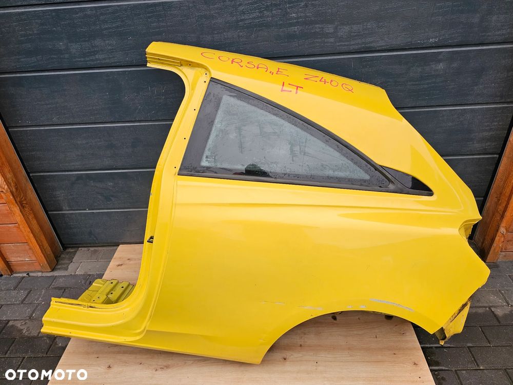 ĆWIARTKA BŁOTNIK LEWY TYŁ TYLNA LEWA OPEL CORSA E 3 DRZWI Z40Q