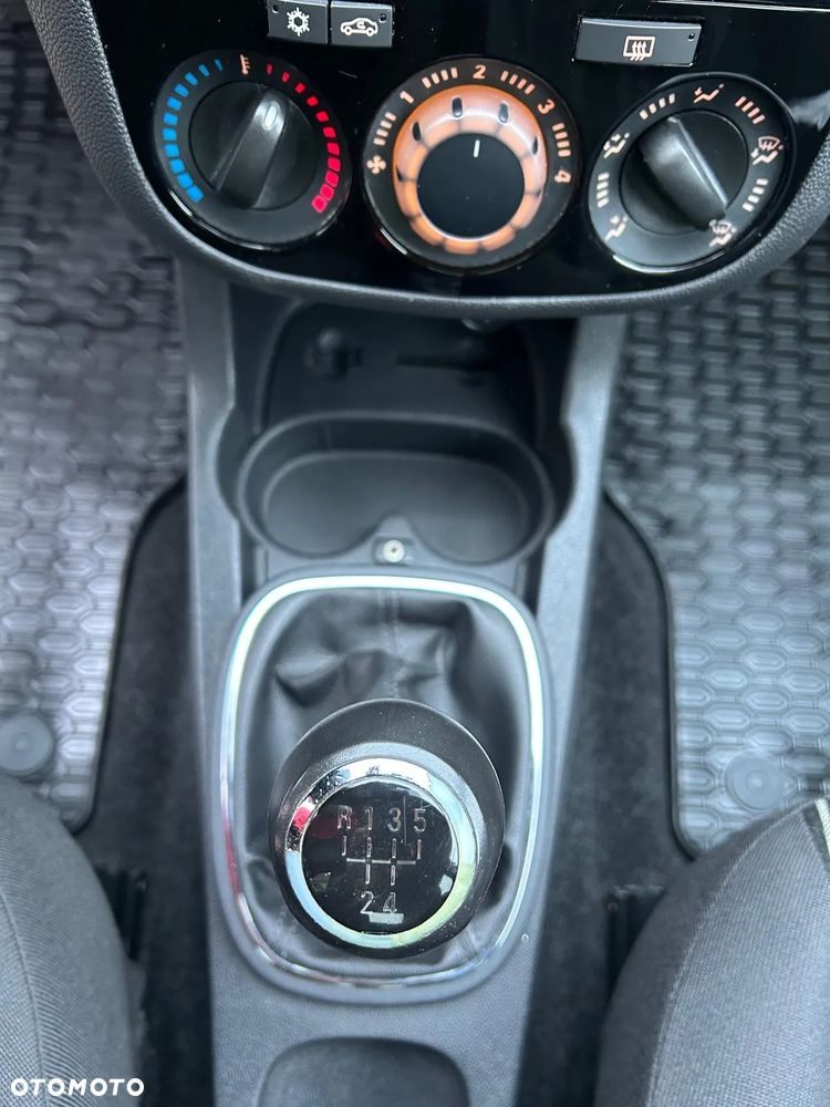 Opel Corsa 1.2 16V Enjoy - 23