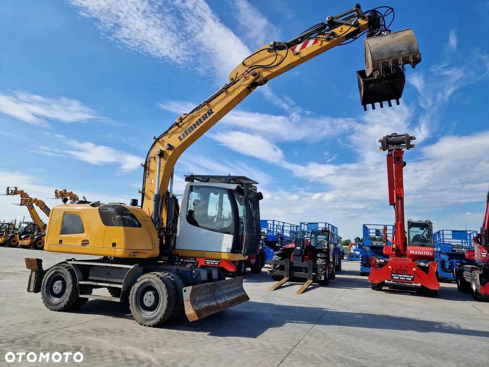 Liebherr A 914 Litronic jak TEREX CAT SENNEBOGEN M497 - 21