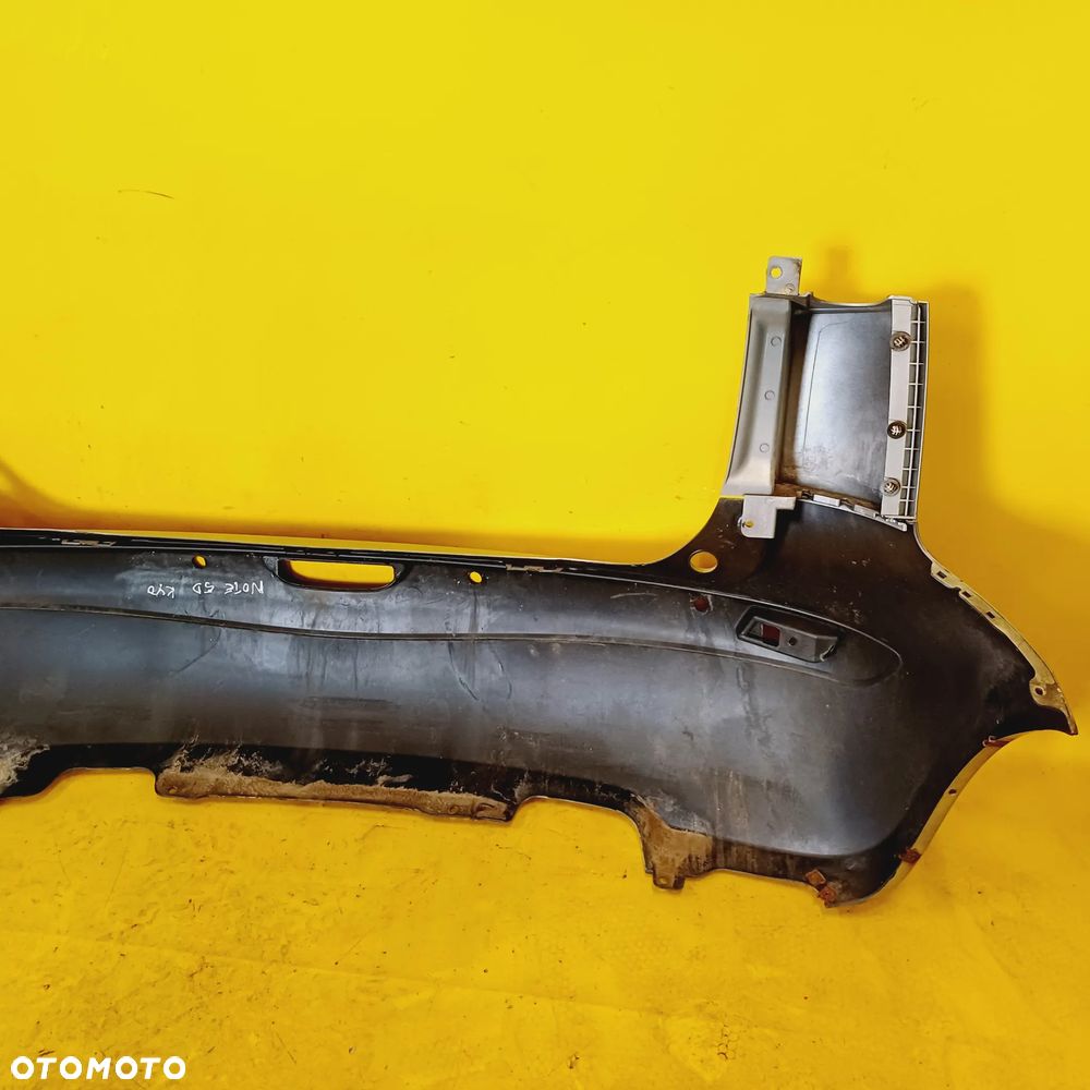 ZDERZAK TYŁ TYLNY POD PDC NISSAN NOTE I E11 5D MINIVAN LAK. KY0 NR501 - 17