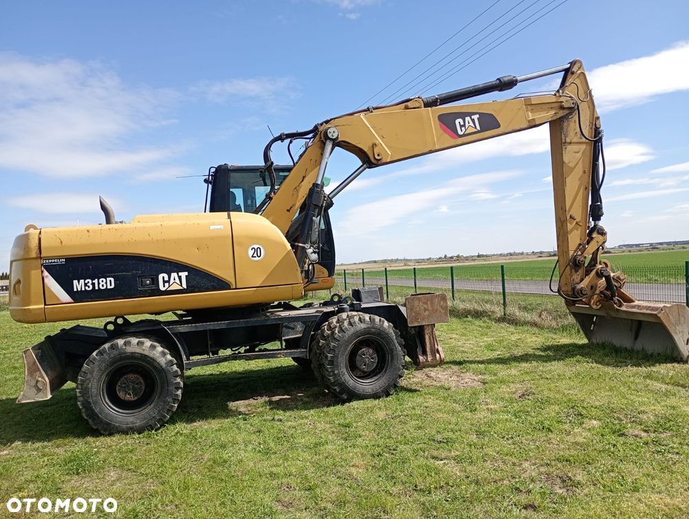 Caterpillar M318D - 1