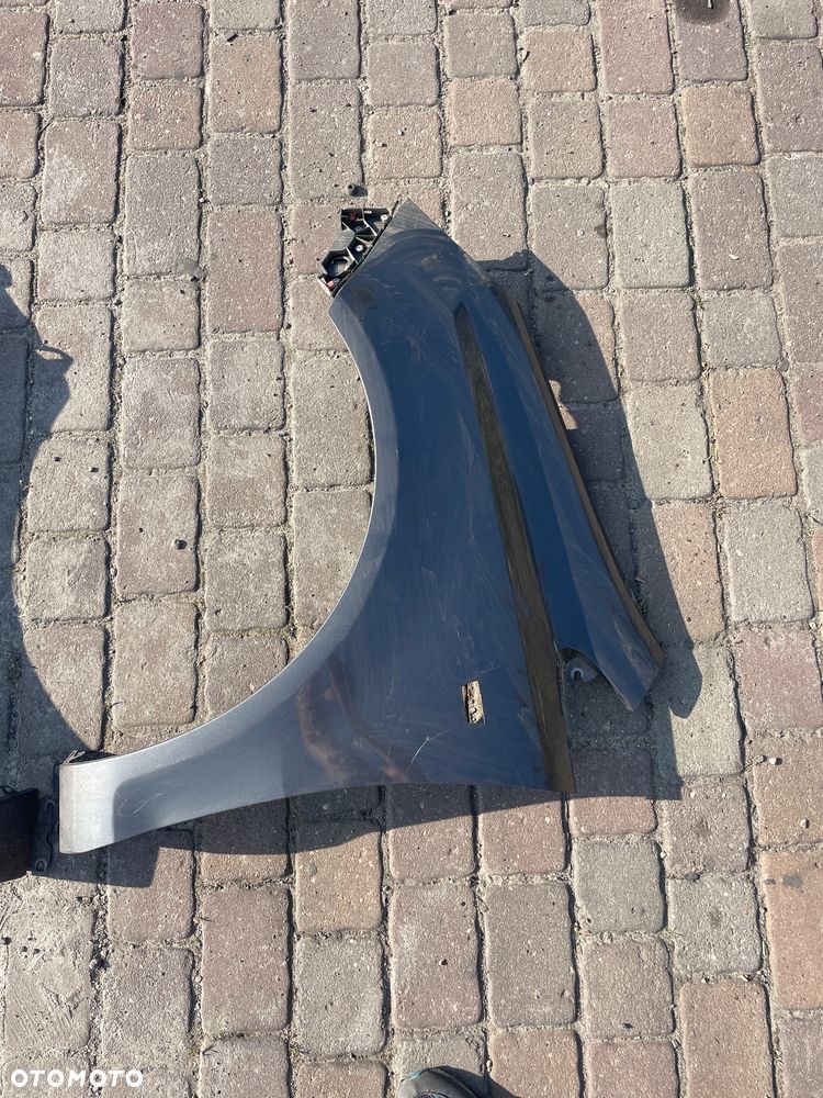 Błotnik przedni prawy i lewy Opel Corsa D - 2