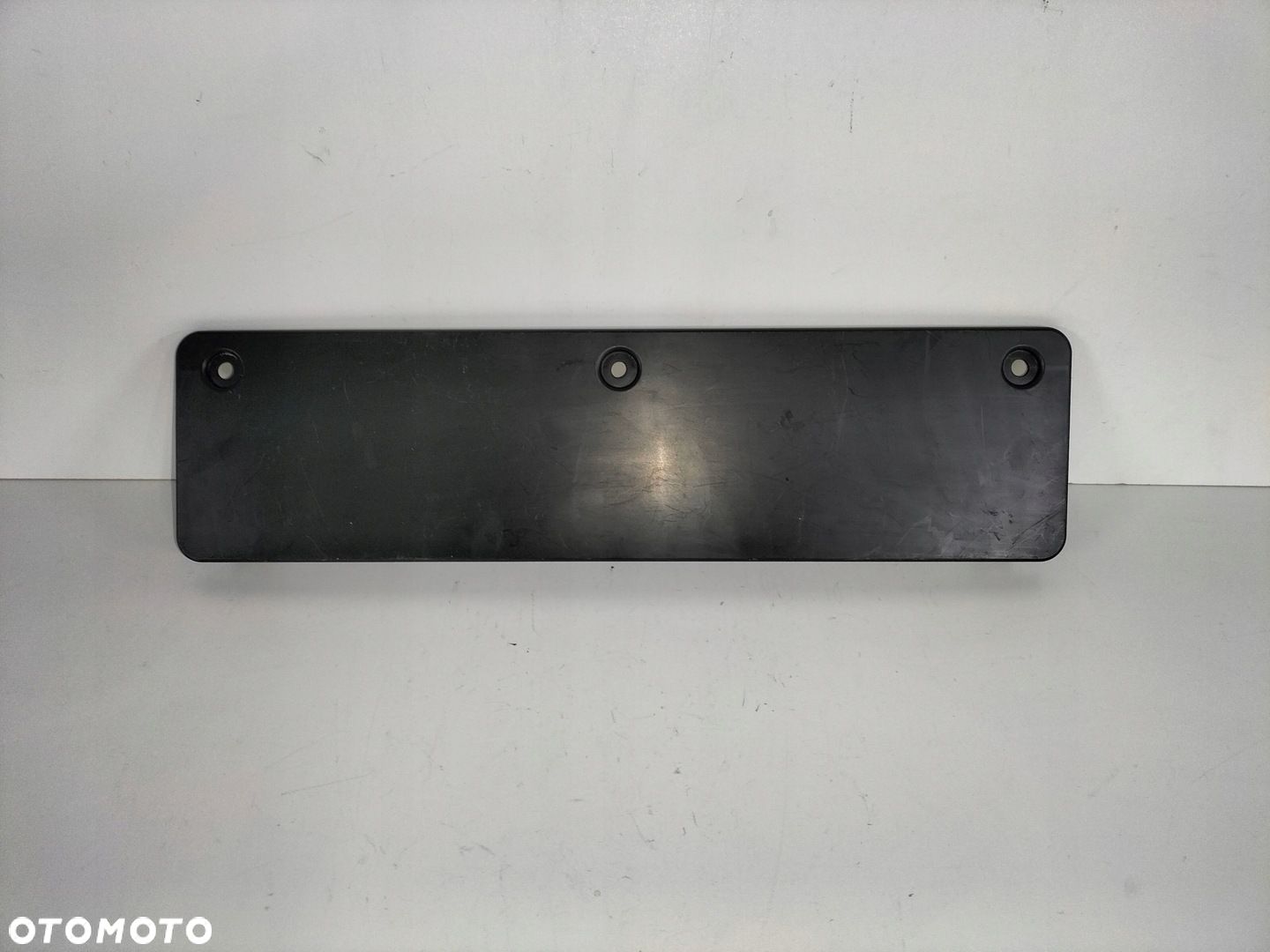 Podkładka pod tablicę rejestracyjną przód VW GOLF VIII 8 LIFT 23- - 1