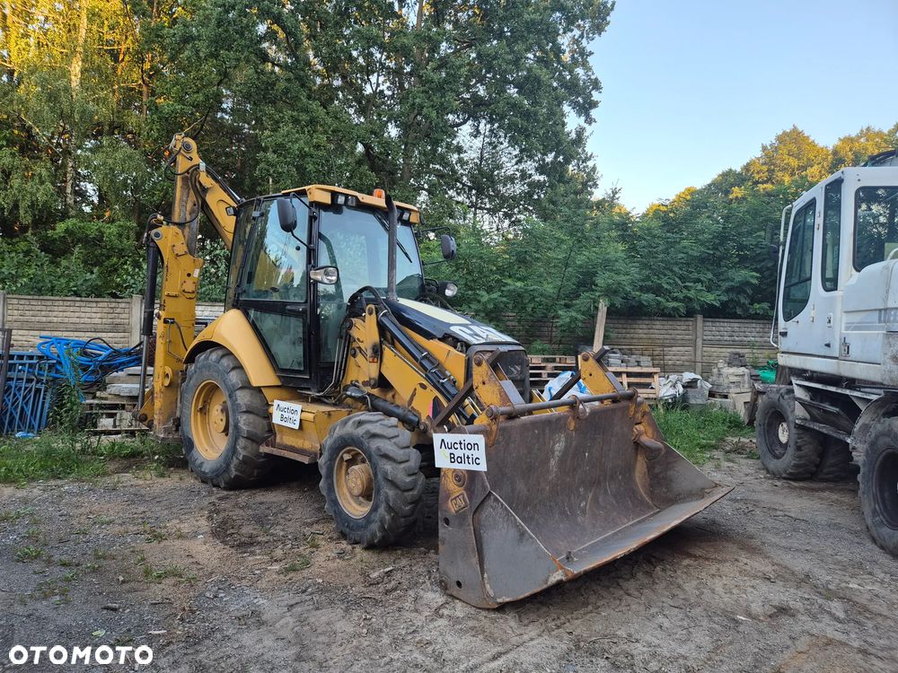 Caterpillar 428 E - 1