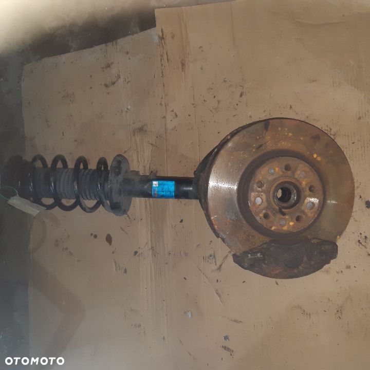 Amortyzator sprężyna przód  VW Passat B6 824904005795 LEWY - 1
