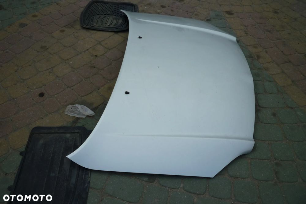 maska Toyota Avensis T25 lift - 4