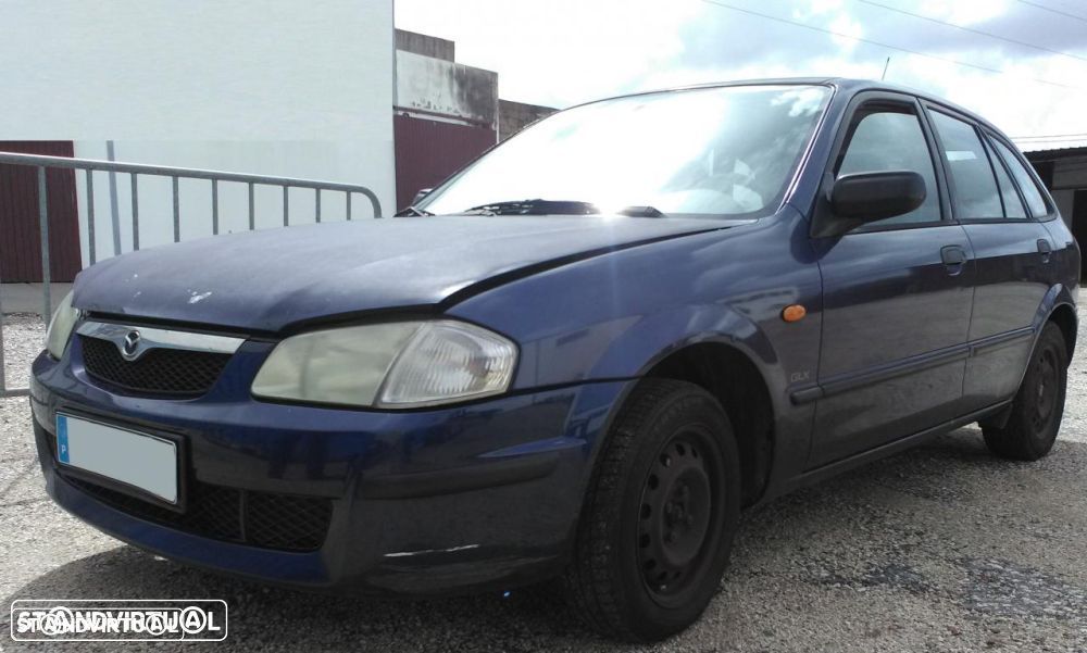 Mazda 323 gasolina de 2000 para peças - 1