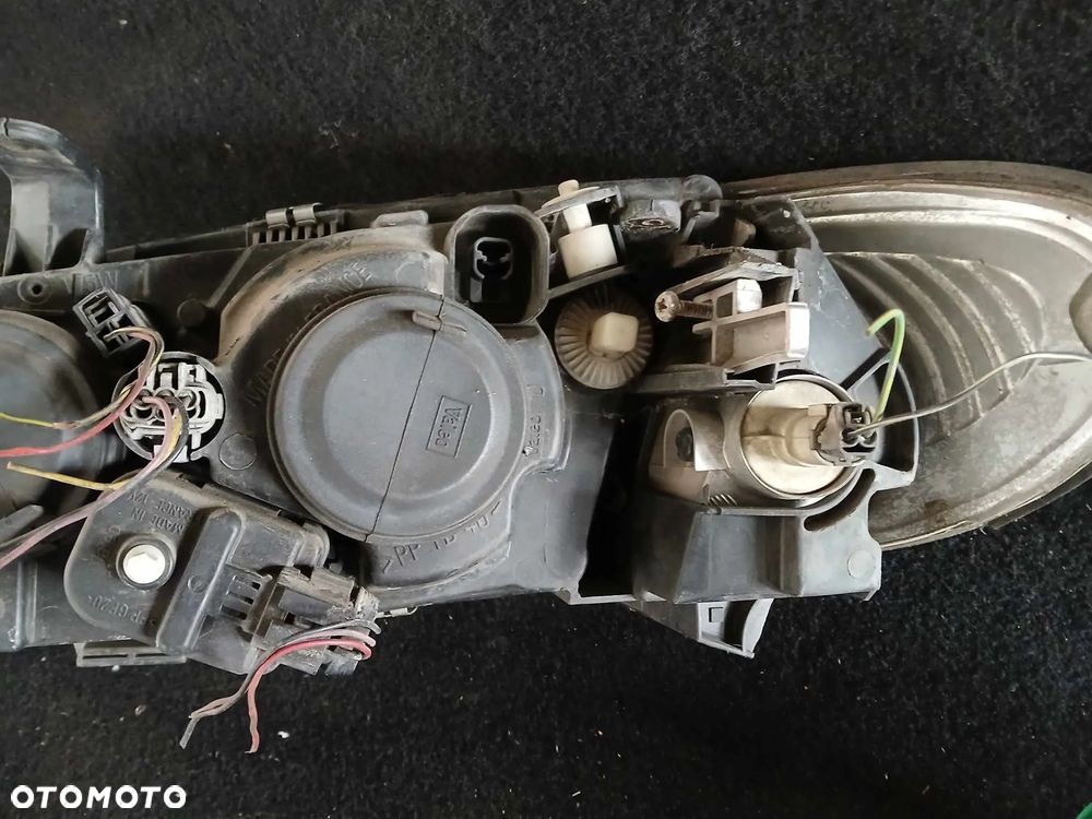 Nissan Almera II N16 lampa przednia lewa - 6