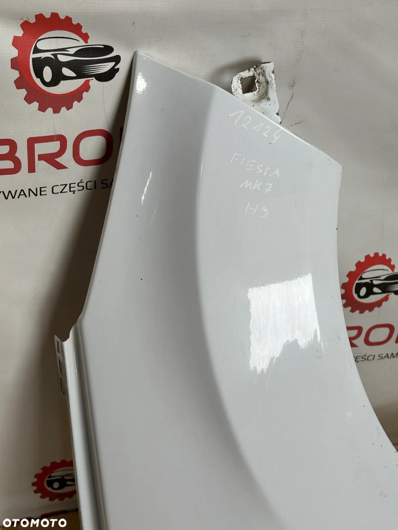 BŁOTNIK PRZEDNI PRAWY FORD FIESTA MK7  H9 - 2